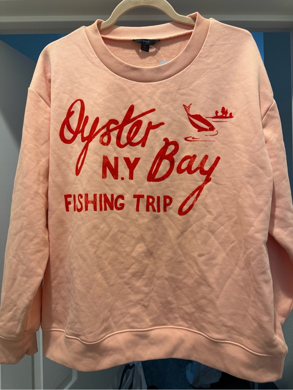 J. Crew Peach Sweatshirt with Red Fishing Graphic